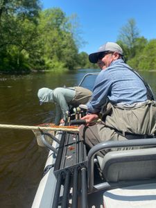 A person fishing in Vermont