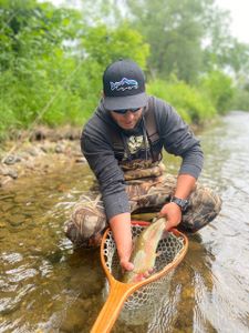 A person fishing in Vermont