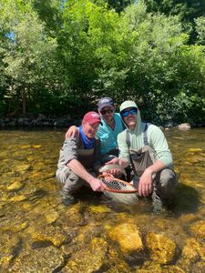Exciting fishing scene with 3 people