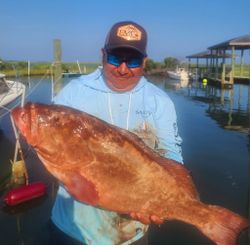 Angler holding a big fish in Sneads Ferry