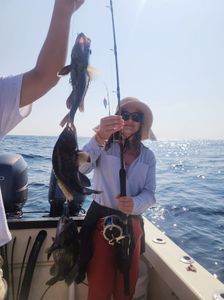 Three small fish caught while fishing at Sneads Ferry