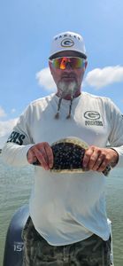 Proud flounder catch on the bay!