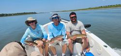 Great crew showing off Redfish catches!