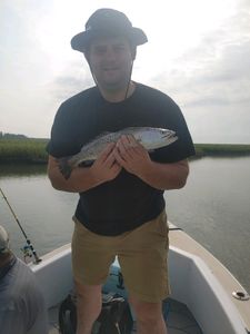 Angler enjoying a day of fishing at Folly Beach