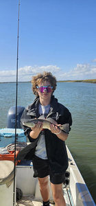 Angler with one fish at Folly Beach