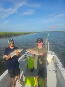 Two redfish, 20 inches long, caught while fishing at Folly Beach