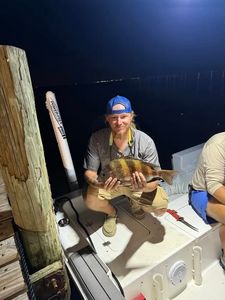 A person fishing in Spanish Fort