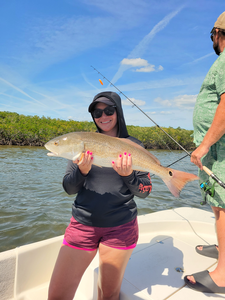 Huge redfish reeled in under clear skies in Homosassa!