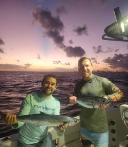 Two people fishing in Miami