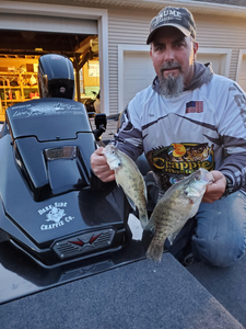 Two fishing rods with 2 fish caught in Missouri