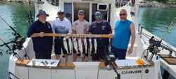 Group of 5 people enjoying fishing trip in WI