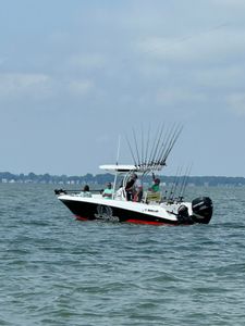 Three people fishing in Michigan