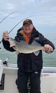 A lone angler fishing in Ludington