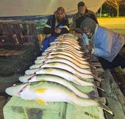 A group of 3 people fishing in Michigan