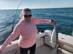 Angler with an Atlantic Bonito fish caught in Hampstead
