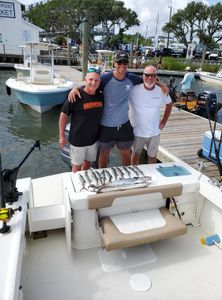 Three people fishing in North Carolina