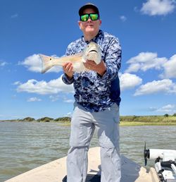 Angler with fishing rod at Matagorda
