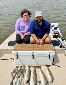 Two anglers fishing in Matagorda