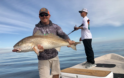 Two people fishing in TX