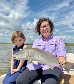 Two people fishing at Matagorda