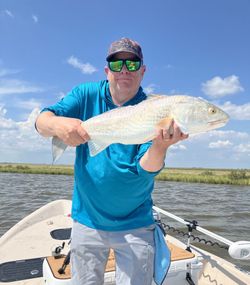 A person fishing in TX