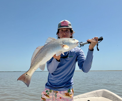 A person fishing in Matagorda