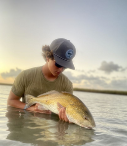 A person fishing in TX
