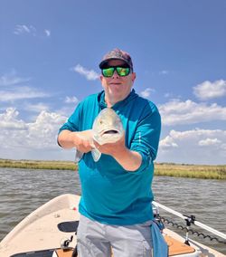 A person fishing in Matagorda
