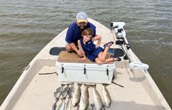 Two people fishing in TX