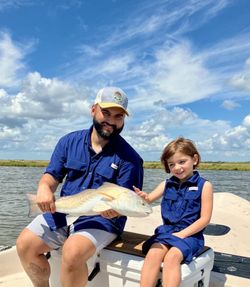 Two people fishing at Matagorda