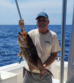 A person fishing at Pensacola Beach