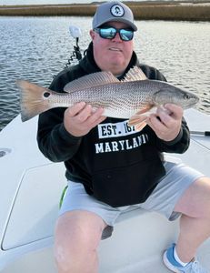 Angler with redfish in North Carolina