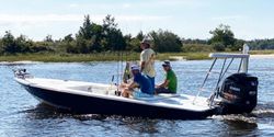 3 people enjoying a fishing trip at Cedar Point