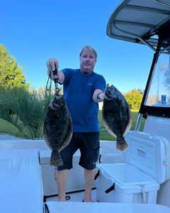 Two large southern flounder caught fishing in North Carolina