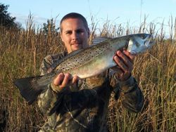 Fisherman with huge spotted weakfish catch at Cedar Point