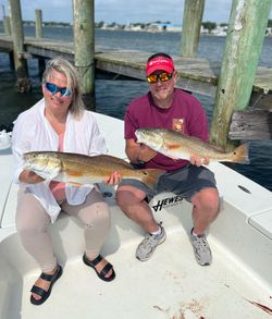 Two large redfish caught while fishing at Cedar Point