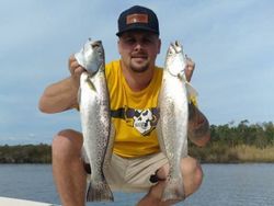 Two spotted weakfish, 19 inches long, caught while fishing at Cedar Point
