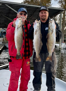 Two anglers with 3 spotted weakfish in North Carolina