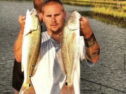 Two redfish caught at Cedar Point fishing location