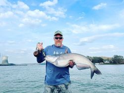 Angler holding a big blue catfish in TN