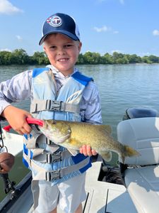 Angler holding a 17-inch fish at Watts Bar Lake