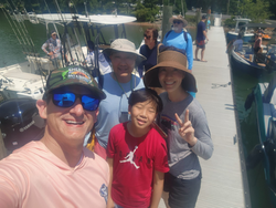 7 people enjoying a fishing trip in GA