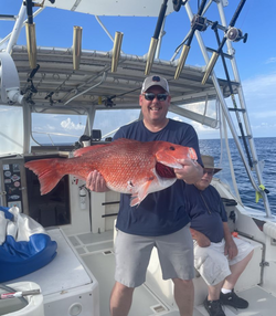 Pair of anglers enjoying a fishing trip in FL