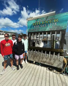 4 people enjoying a fishing trip in Destin