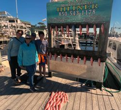 4 people fishing in Destin