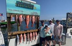7 fishing rods with a great catch of fish in Destin