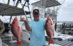 Two grey snapper fish caught in FL