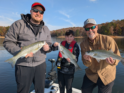 Nice striped bass using jigging and trolling techniques in clear conditions!