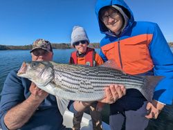 Striped bass caught by two anglers in Gainesville