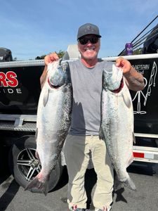 Two Chinook and Coho salmon caught while fishing in OR